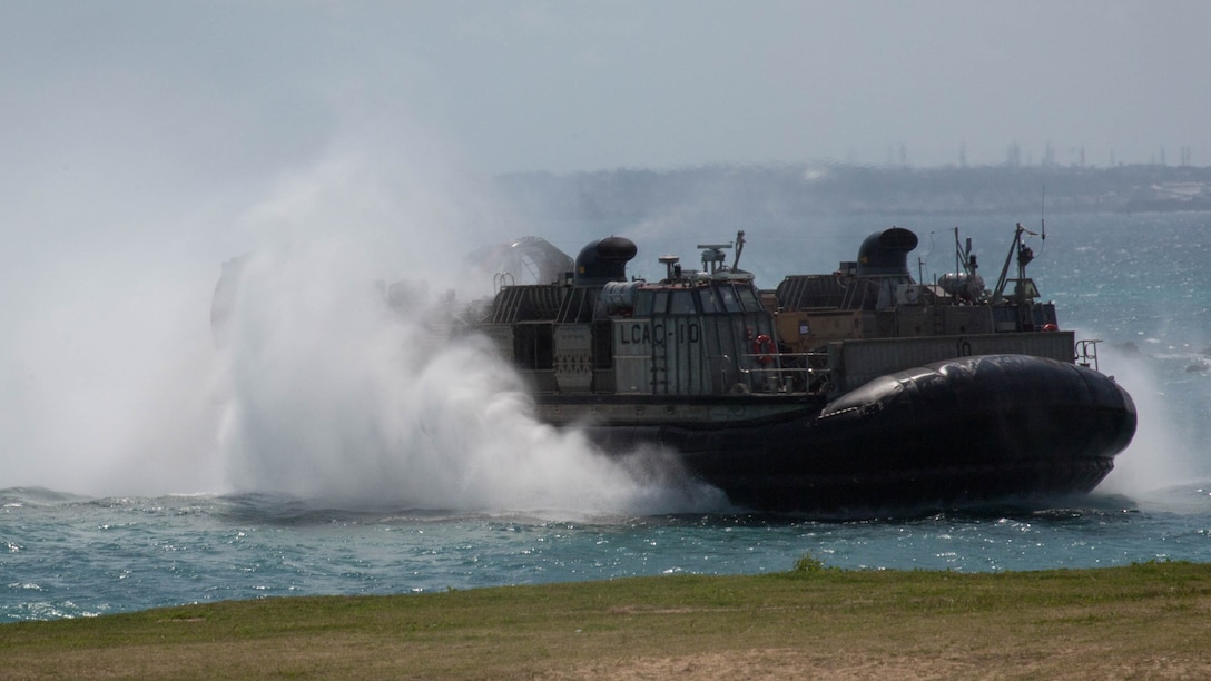 A Navy Landing Craft, Air-Cushioned hovercraft with the Bonhomme Richard Amphibious Ready Group maneuvers towards shore at Kin Blue Training Area, Okinawa, Japan, April 6, 2017. The 31st Marine Expeditionary Unit offloaded equipment and vehicles, completing their regularly scheduled spring deployment. As the Marine Corps' only continuously forward-deployed unit, the 31st MEU air-ground-logistics team provides a flexible force, ready to perform a wide range of military operations, from limited combat to humanitarian assistance operations, throughout the Indo-Asia Pacific region. 