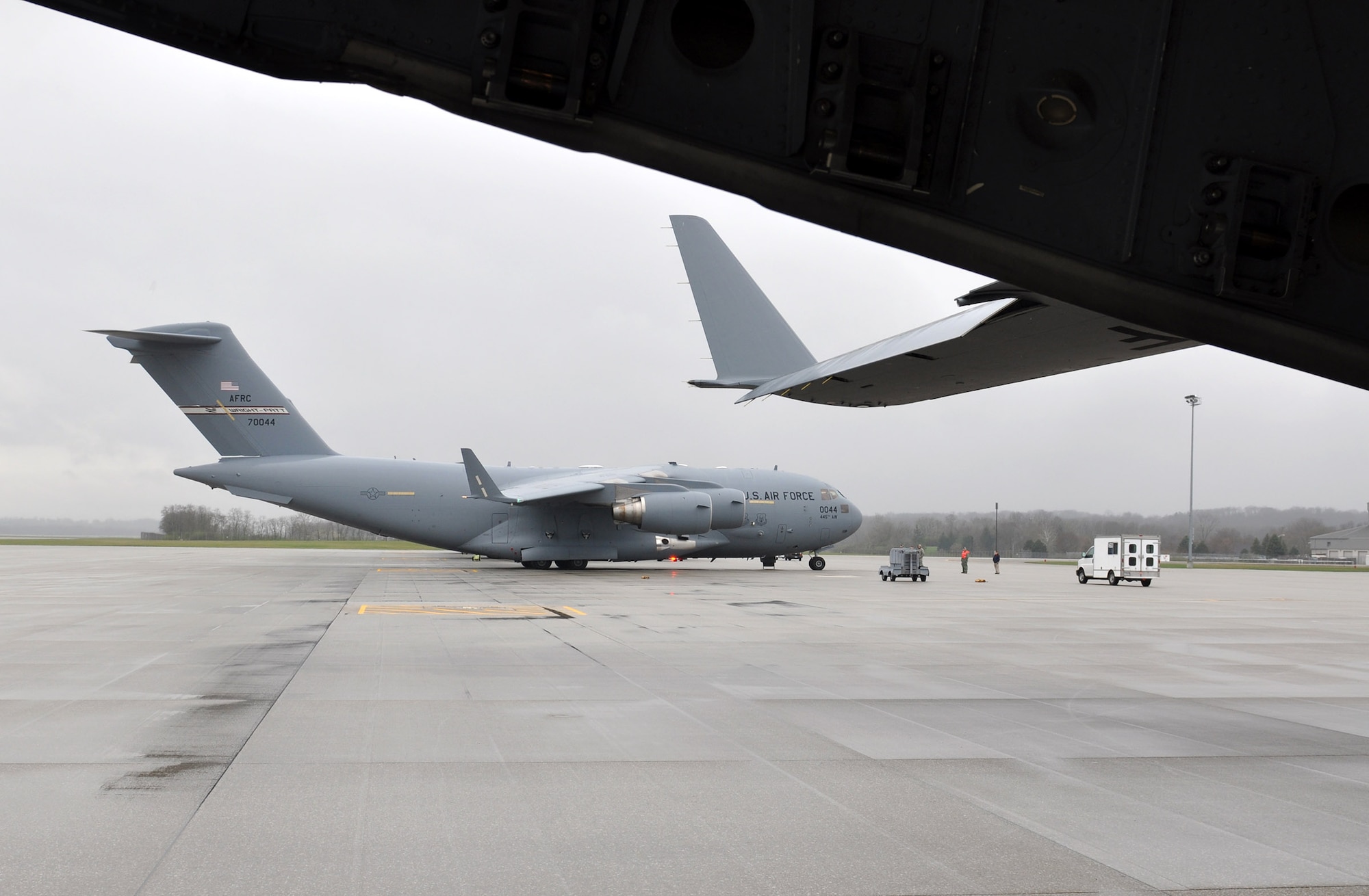 A 445th Airlift Wing C-17 Globemaster III prepares to depart Wright-Patterson Air Force Base, Ohio for a mission March 31, 2017. The wing currently has nine C-17s in it's inventory. The aircraft provides a major portion of the Air Force's strategic airlift capability. (U.S. Air Force photo/Stacy Vaughn)