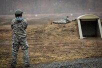 A sponsor watches his Soldier compete on the Rifle Marksmanship event of the Best Warrior Competition at Fort Devens, Massachusetts, April 4, 2017. Sponsors evaluate, train, and mentor Soldiers  to ensure the truely elite make it to a Best Warrior Competition. At this level of competition Soldiers participate in a series of events to determine who will represent the 80th TC and 99th RSC as the Warrior and Best Noncomissioned Officer at the USARC Best Warrior Competition in June.