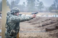 U.S. Army Staff Sgt. Joshua Deiss, a competitor in the 80th Training Command and 99th Regional Support Command’s Best Warrior Competition, fires an M9 pistol during a qualification range, here, April 4, 2017.