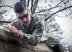 U.S. Army Sgt. Joshua D. Meyer climbs over a wall during the obstacle course portion of the 80th Training Command and 99th Regional Support Command’s combined Best Warrior Competition April 5, 2017.