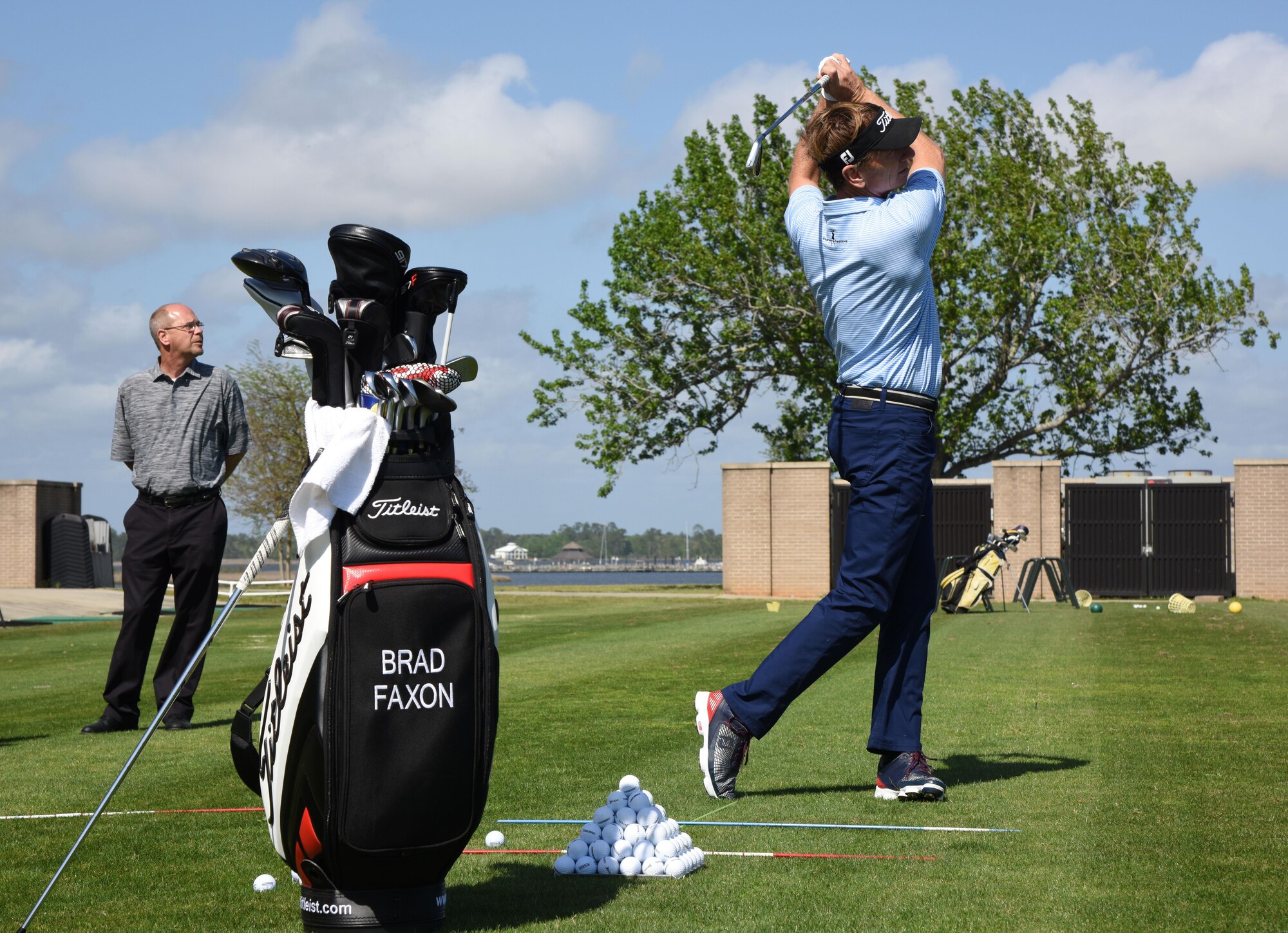 Brad Faxon, Professional Golfers’ Association champion player, provides golfing tips to Keesler personnel during a free clinic at the Bay Breeze Golf Course March 29, 2017, on Keesler Air Force Base, Miss. Faxon is an eight-time PGA Tour Champion and this is the third time he has held a clinic at Keesler. (U.S. Air Force photo by Kemberly Groue)