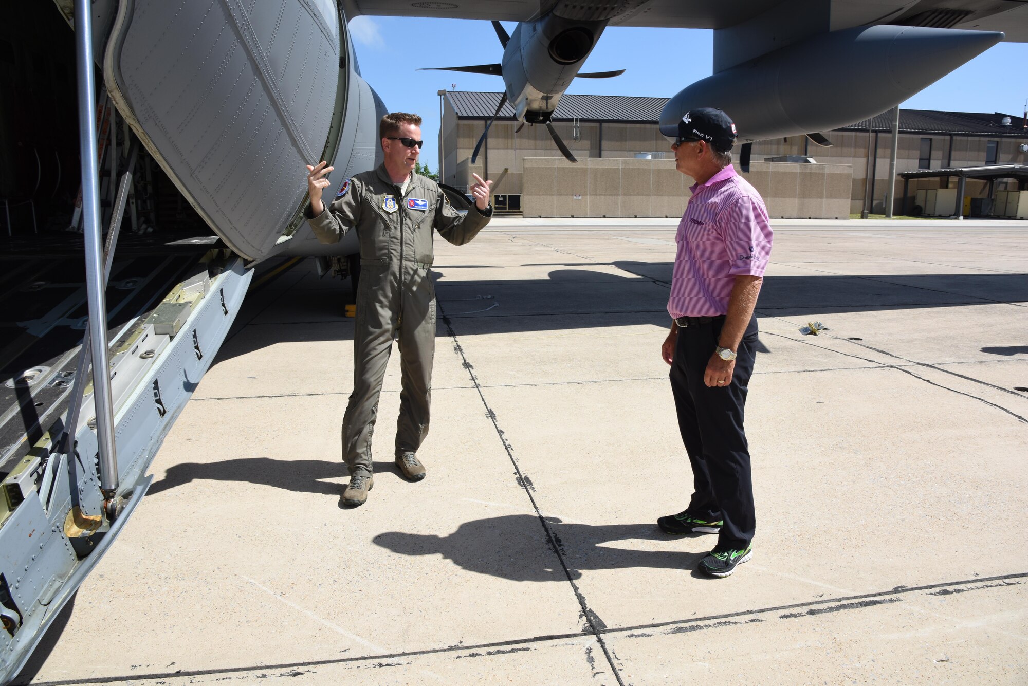 Lt. Col. Sean Cross, 53rd Weather Reconnaissance Squadron instructor pilot, provides a tour of a WC-130J Hercules to Mike Goodes, Senior Professional Golfers’ Association player, March 29, 2017, on Keesler Air Force Base, Miss. Goodes, who participated in the 2017 Mississippi Resort Golf Classic, also received a windshield tour of Keesler and a Science on a Sphere demonstration. (U.S. Air Force photo by Kemberly Groue)