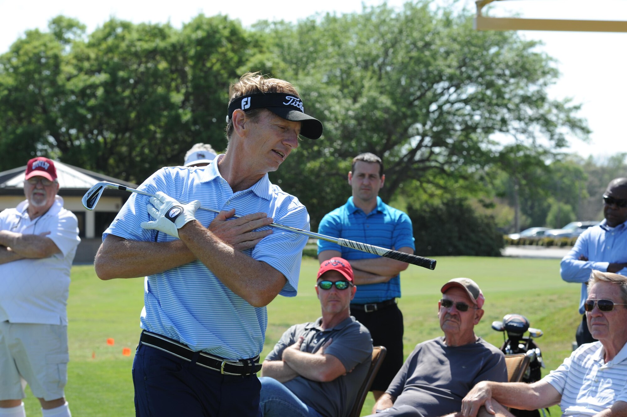 Brad Faxon, Professional Golfers’ Association champion player, provides golfing tips to Keesler personnel during a free clinic at the Bay Breeze Golf Course March 29, 2017, on Keesler Air Force Base, Miss. Faxon is an eight-time PGA Tour Champion and this is the third time he has held a clinic at Keesler. (U.S. Air Force photo by Kemberly Groue)
