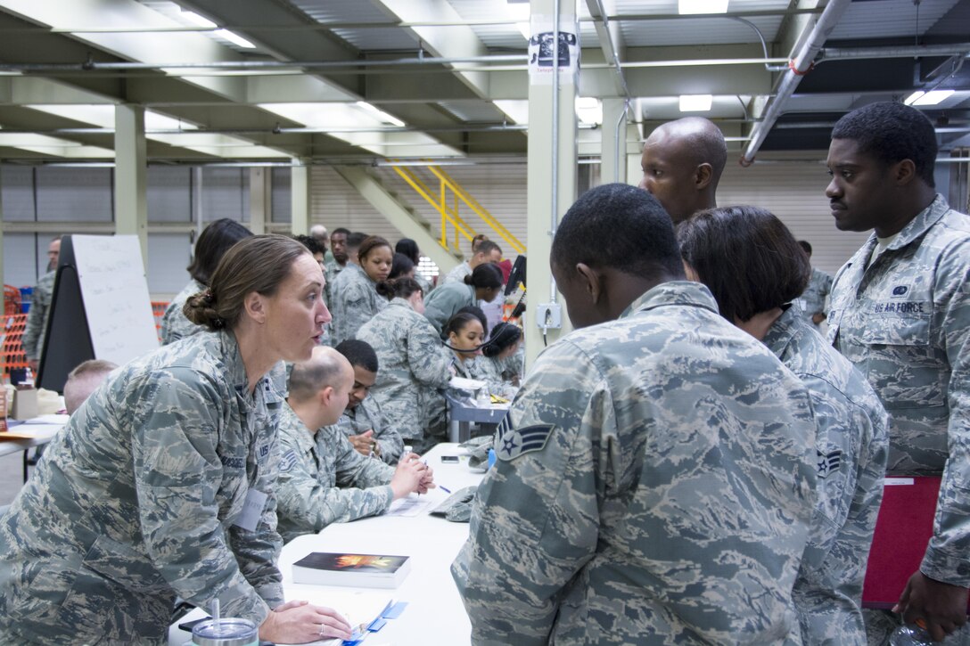 Capt.. Bevin Gugliucciello 512th Airlift Wing judge advocate, briefed Airmen during a pre-deployment function line exercise, Dover Air Force Base, Del. Apr. 2, 2017. Gugliucciello spoke on the importance of wills and power of attorney to Airmen. (U.S. Air Force Photo/Senior Airman. Damien Taylor)