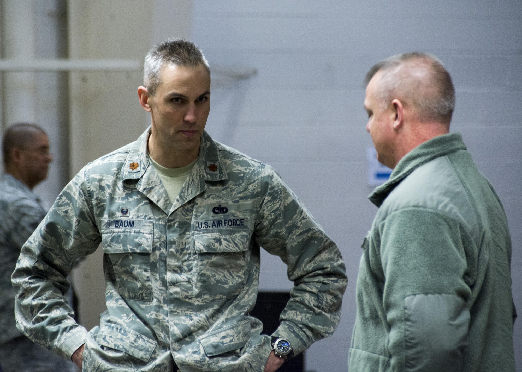 Maj. Jon Baum, 512th Logistics Readiness Squadron commander, speaks with Col. D. Scott Durham, 512th Airlift Wing commander, about the progress of the pre-deployment function line exercise at Dover Air Force Base, Apr. 2, 2017. The wing conducted the exercise to display capabilities and test deployment readiness.  (U.S Air Force Photo/Senior Airman Damien Taylor)