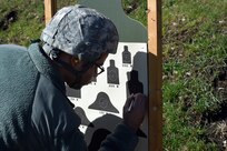 Army Reserve Spc. Matthew Kelly, Human Resources Specialist, 85th Support Command, reviews his qualification performance during the 85th Support Command’s headquarters individual weapons qualification at Joliet Training Area, April 1, 2017. The headquarters staff spent one battle assembly day at the qualification range achieving a 100 percent qualification rate on the M-16 rifle and an 88 percent qualification rate on the M9 pistol. Kelly qualified with 34 out of 40 targets hit.
(U.S. Army Reserve photo by Sgt. Aaron Berogan)