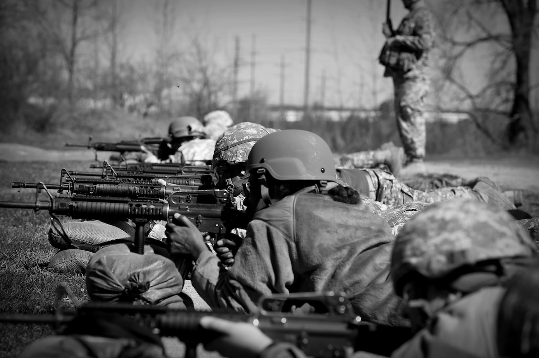 Army Reserve Soldiers assigned to the 85th Support Command prepare to engage their targets during an individual weapons qualification at the Joliet Training Area, Apr. 1, 2017. The headquarters staff spent one battle assembly day at the qualification range achieving a 100 percent qualification rate on the M-16 rifle and an 88 percent qualification rate on the M9 pistol. 
(U.S. Army Reserve photo by Sgt. Aaron Berogan)