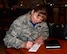 Master Sgt. Jennifer Cook, manpower office superintendent assigned to the 28th Force Support Squadron, donates to the Air Force Assistance Fund in the Dakota’s Cub at Ellsworth Air Force Base, S.D., March 31, 2017. The AFAF is an annual effort to raise funds for charitable affiliates that provide support to Air Force families in need including active duty, retirees, reservists, guard and dependents. (U.S. Air Force photo by Airman 1st Class Donald C. Knechtel)