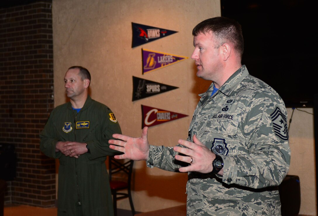 Col. Gentry Boswell, 28th Bomb Wing commander, and Chief Master Sgt. Adam Vizi, 28th Bomb Wing command chief, speak on the importance of the Air Force Assistance Fund inside the Dakota’s Cub at Ellsworth Air Force Base, S.D., March 31, 2017. If interested in donating contact a unit AFAF representative. For more information on the different charities, call (800) 258-1413 for Air Force Enlisted Village, (800) 554-5510 for the General and Mrs. Curtis E. LeMay Foundation, (800) 655-3083 for Air Force Villages Indigent Widows' Fund, and (703) 972-2650 for Air Force Aid Society. (U.S. Air Force photo by Airman 1st Class Donald C. Knechtel)