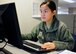 Airman 1st Class Vien Roman, 62nd Comptroller Squadron financial services technician, inputs information at the finance customer service desk, April 5, 2017 at McChord Field, Wash. Open from 9 a.m. to 3 p.m. Monday, Wednesday and Friday, and 7:30 a.m. to 3 p.m. Tuesday and Thursday, financial technicians assist Airmen one-on-one to ensure mutual understanding and expeditious support. (U.S. Air Force photo/Staff Sgt. Whitney Amstutz)