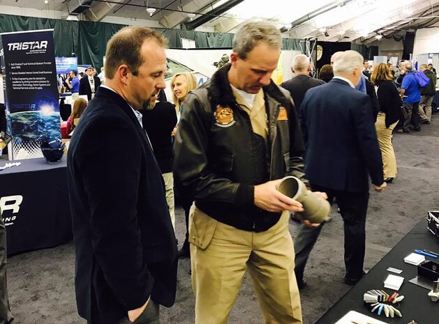 170404-N-EJ140-001 - NSWC Crane Commanding Officer Capt. JT Elder interacts with a first-time vendor at #BuyIndiana.