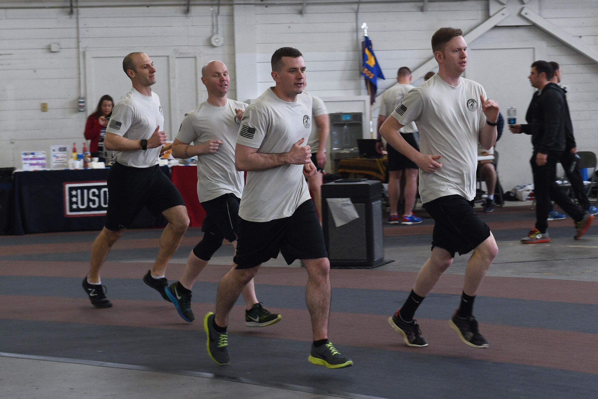 Members of the 3rd Air Support Operations Squadron participate in the annual 24-hour run challenge in Hangar 5 at Joint Base Elmendorf-Richardson, Alaska, March 30, 2017. During the challenge, at least one tactical air control party member ran at any point during the 24 hours. The TACP Airmen also passed a baton listing the names of fallen TACP Airmen to ensure those who made the ultimate sacrifice are never forgotten.