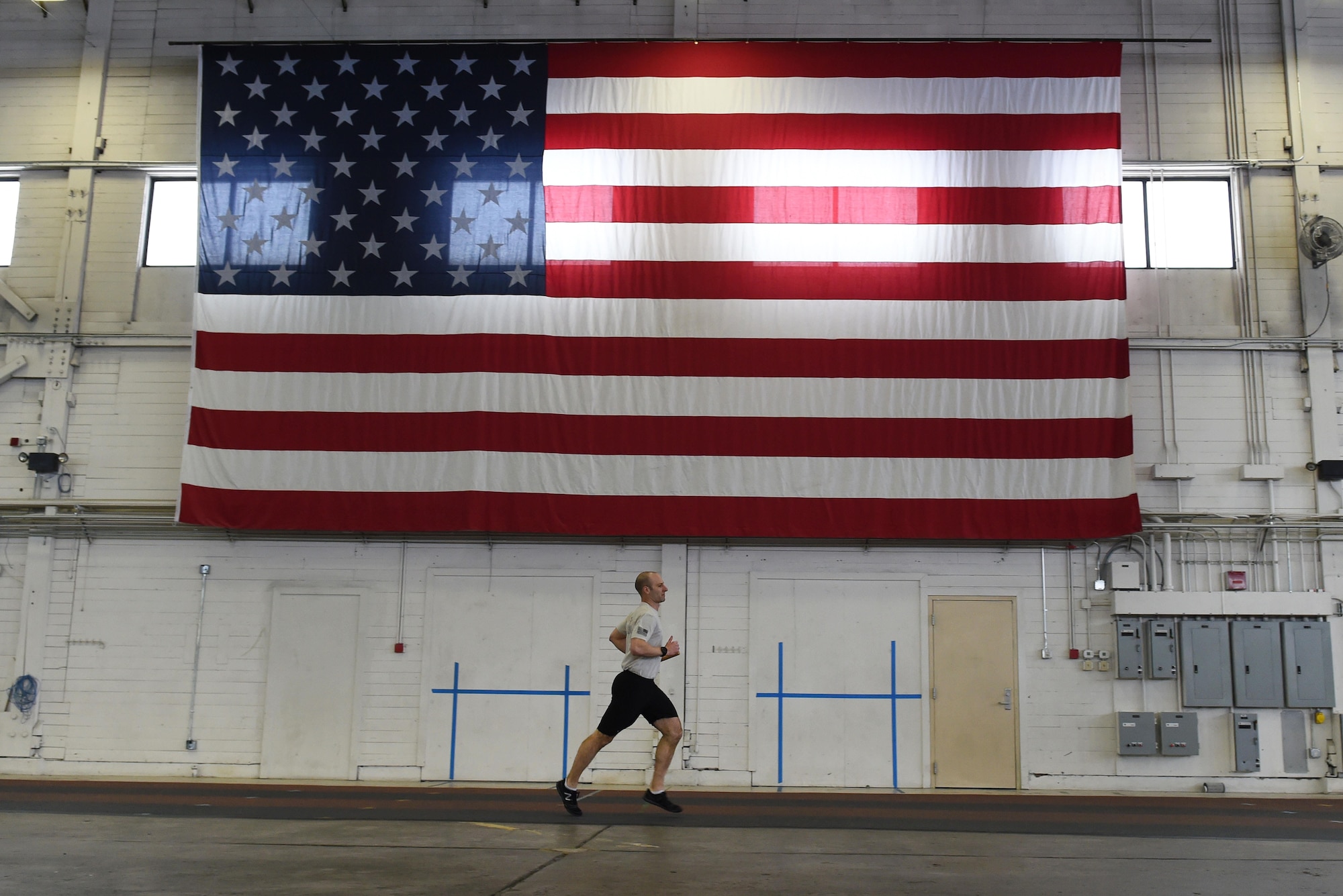 Members of the 3rd Air Support Operations Squadron participate in the annual 24-hour run challenge in Hangar 5 at Joint Base Elmendorf-Richardson, Alaska, March 30, 2017. During the challenge, at least one tactical air control party member ran at any point during the 24 hours. The TACP Airmen also passed a baton listing the names of fallen TACP Airmen to ensure those who made the ultimate sacrifice are never forgotten. 