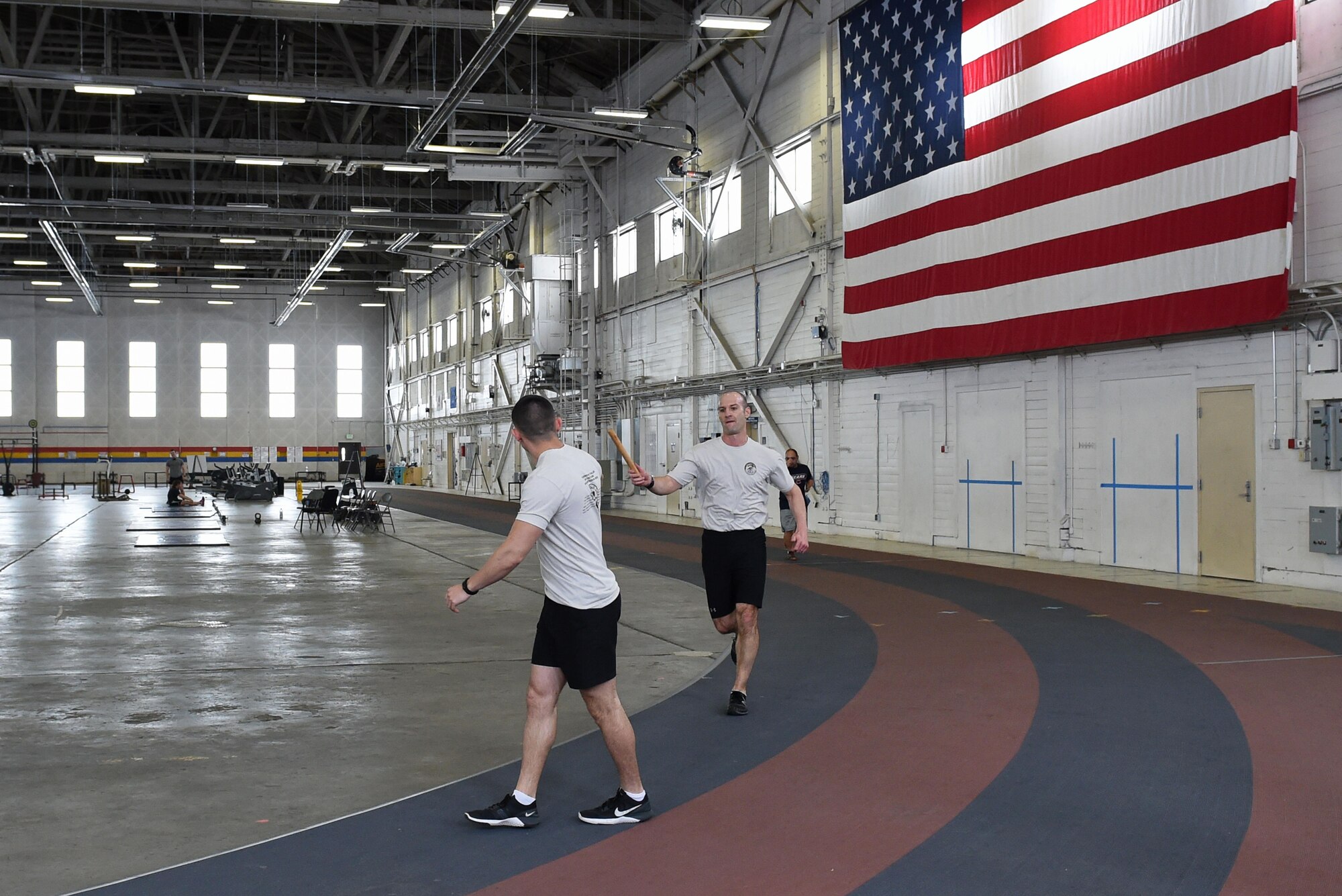 Members of the 3rd Air Support Operations Squadron participate in the annual 24-hour run challenge in Hangar 5 at Joint Base Elmendorf-Richardson, Alaska, March 30, 2017. During the challenge, at least one tactical air control party member ran at any point during the 24 hours. The TACP Airmen also passed a baton listing the names of fallen TACP Airmen to ensure those who made the ultimate sacrifice are never forgotten. 