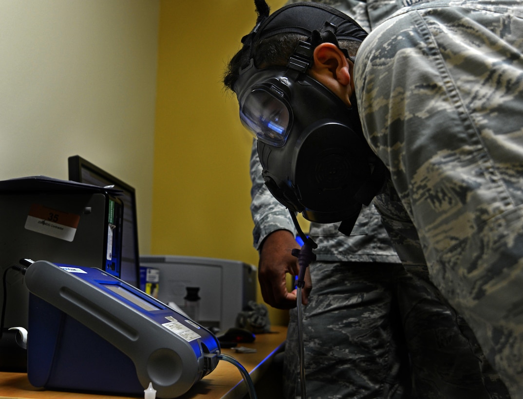 Airman tests gas mask fit