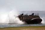 A Navy Landing Craft, Air-Cushioned hovercraft with the Bonhomme Richard Amphibious Ready Group maneuvers towards shore at Kin Blue Training Area, Okinawa, Japan, April 6, 2017. The 31st Marine Expeditionary Unit offloaded equipment and vehicles, completing their regularly scheduled spring deployment. As the Marine Corps' only continuously forward-deployed unit, the 31st MEU air-ground-logistics team provides a flexible force, ready to perform a wide range of military operations, from limited combat to humanitarian assistance operations, throughout the Indo-Asia Pacific region.