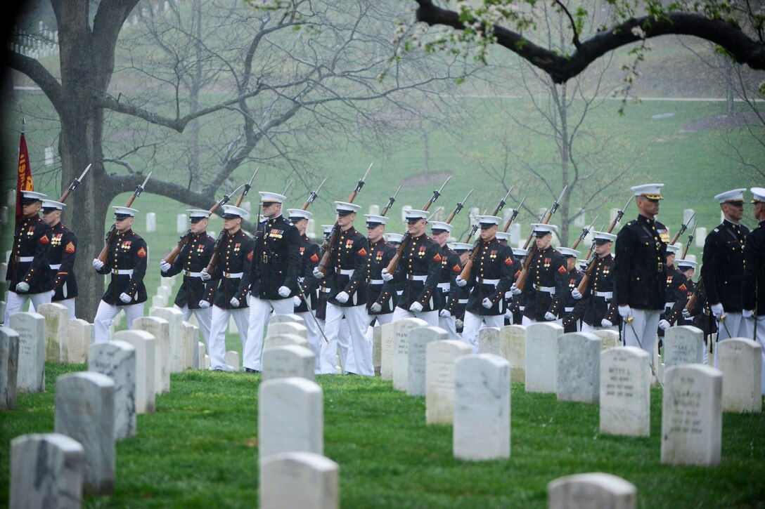 Marines assigned to Marine Barracks Washington participate in the graveside service for John Glenn in Section 35 of Arlington National Cemetery in Arlington, Va, April 6, 2017. Glenn, a Marine who became the first American astronaut to orbit the Earth and later a United States senator, died Dec. 8, 2016. Army photo by Rachel Larue 