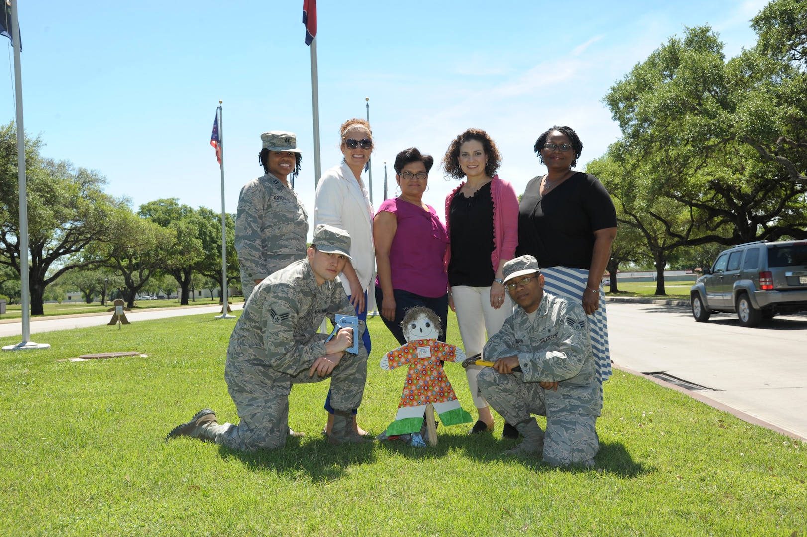 Members from the 359th Medical Operations Group, Family Advocacy program place Cardboard Kid cut-outs at Joint Base San Antonio-Randolph, April 6, 2017 in support for Child Abuse Prevention Month. Cardboard Kid cut-outs will be displayed throughout JBSA during the month of April.