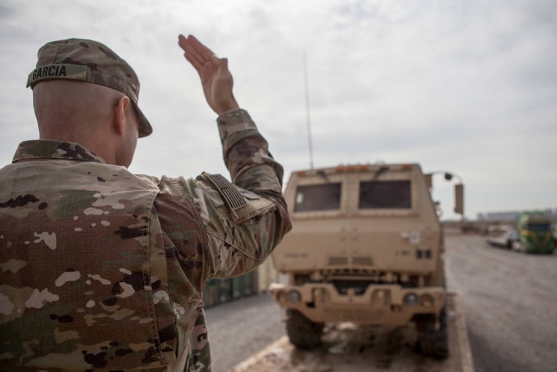 Army Sgt. 1st Class Henry Garcia, deployed in support of Combined Joint Task Force Operation Inherent Resolve and assigned to 583rd Forward Support Company, loads a vehicle for transportation near Irbil, Iraq, March 21, 2017. Army photo by Sgt. Josephine Carlson
