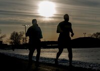 Soldiers conduct the two-mile run portion of the Army Physical Fitness Test during the 80th Training Command and 99th Regional Support Command's combined Best Warrior Competition at Fort Devens, Massachusetts April, 3, 2017.