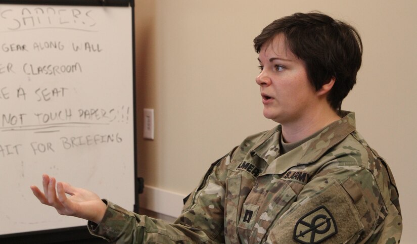 Capt. Kassondra Palmer, commander of the 443rd Transportation Company out of Elkhorn, Neb., gives a briefing during an emergency response scenario as part of the Defense Support of Civil Authorities workshop held in Belton, Mo., on April 2, 2017. (U.S. Army Reserve photo by Spc. Christopher A. Hernandez, 345th Public Affairs Detachment)