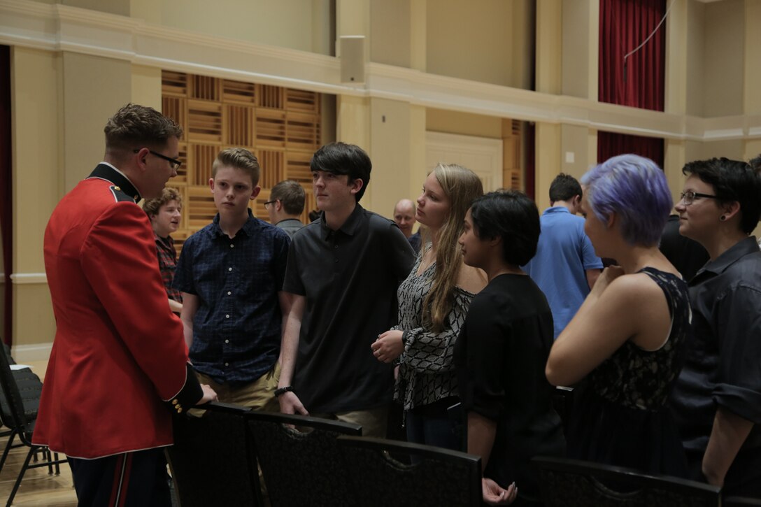 On April 2, 2017, members of the Marine Band and Marine Chamber Orchestra performed a chamber series concert in John Philip Sousa Band Hall at the Marine Barracks Annex. Following the concert, members spent time with students from North Oconee High School from Bogart, Ga. (U.S. Marine Corps photo by Gunnery Sgt. Rachel Ghadiali/released) 