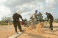 1st Lt. Hunter Peoples, an engineer with 672nd Engineer Company, an Army Reserve unit from Missoula, Montana, works on the foundation for a new clinic building at the Ladyville Health Clinic in Ladyville, Belize on March 29, 2017. The clinic is being built as part of Beyond the Horizon 2017 a partnership exercise between the Government of Belize and U.S. Southern Command that will consist of three free medical service events and five construction projects throughout Belize. (U.S. Army Photo by Sgt. Eric Roberts)