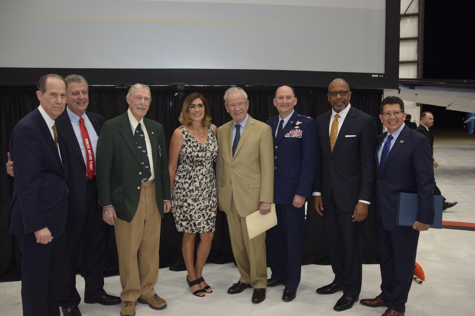 Honorees, from left to right, Wayne Fagan, Chair Honoree Selection Committee, San Antonio Aviation and Aerospace Hall of Fame;  Retired Air Force Col. William Ercoline, who excepted the award on behalf of Col. William Charles Ocker; Retired Air Force Col. W.R. Stewart, who excepted the award for Col. Carl Joseph Crane; Retired, Air Force Lt. Col. E. Olga Custodio, first female Hispanic U.S. military pilot; former San Antonio Mayor, Phil Hardberger; Col. Thomas K. Smith, Jr., 433rd Airlift Wing commander; Dr. Bernard A. Harris, Jr., former NASA astronaut;  and Richard Perez, the President and CEO of the San Antonio Chamber of Commerce pose for a photo after the San Antonio Aviation and Aerospace Hall of Fame awards dinner, March 30, 2017 at the GDC Technics Hanger, Port San Antonio (formerly Kelly Air Force Base), Texas. (U.S. Air Force photo by Minnie Jones)