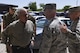 U.S. Marine Corps Lt. Col. (Retired) Oliver North, speaks to U.S. Air Force Lt. Col. Matthew Welling, 312th Training Squadron Commander, at the Fire Academy on Goodfellow Air Force Base, Texas, April 5, 2017. North toured the academy to see how Air Force firefighters are trained. (U.S. Air Force photo by Airman 1st Class Chase Sousa/Released)