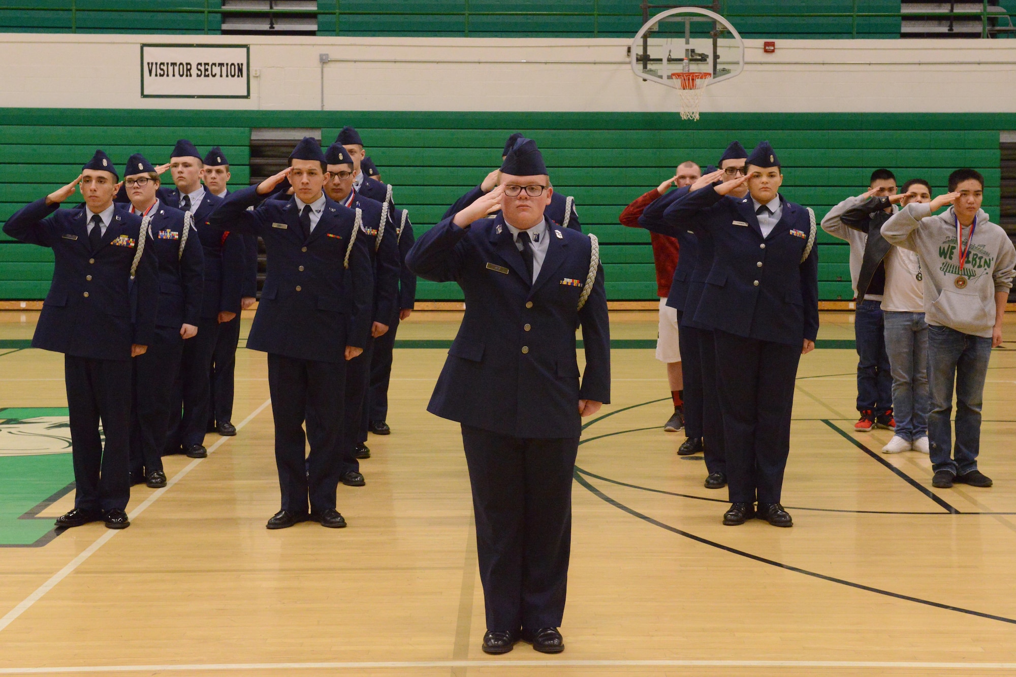 The Sioux City JROTC salutes the winners at the JROTC competition at North High School, Des Moines, Iowa on April 1, 2017. The Davenport JROTC took first and Sioux City took second. (U.S. Air National Guard photo by Airman Katelyn Sprott)