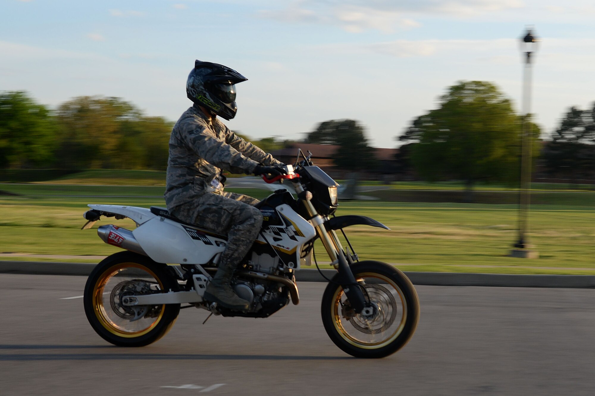 U.S. Air Force Airman 1st Class Omar Campos, 19th Maintenance Squadron crew chief, rides his bike April 5, 2017, at Little Rock Air Force Base, Arkansas. Active duty military members who operate a motorcycle both on and off Little Rock Air Force Base and anyone operating a motorcycle on the base, including passengers, must comply with personal protective equipment requirements as prescribed in Air Force Instruction 91-207, USAF Traffic Safety Program. (U.S. Air Force photo by Airman 1st Class Codie Collins)
