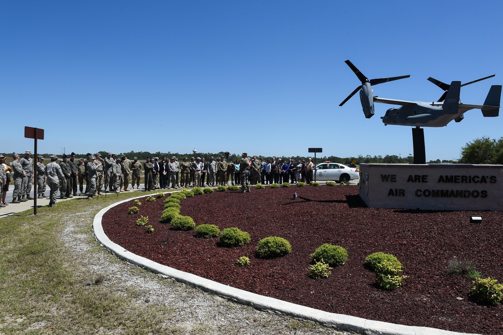 Members of team Hurlburt gather to dedicate the new CV-22 Osprey model at Hurlburt Field, Fla., April 6, 2017. The CV-22 model was donated by the Boeing Company to showcase the capabilities of the CV-22 and to show their appreciation of their partnership with the Air Force. (U.S. Air Force photo by Senior Airman Jeff Parkinson)
