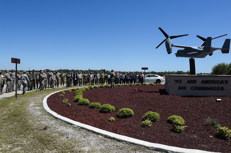 Members of team Hurlburt gather to dedicate the new CV-22 Osprey model at Hurlburt Field, Fla., April 6, 2017. The CV-22 model was donated by the Boeing Company to showcase the capabilities of the CV-22 and to show their appreciation of their partnership with the Air Force. (U.S. Air Force photo by Senior Airman Jeff Parkinson)