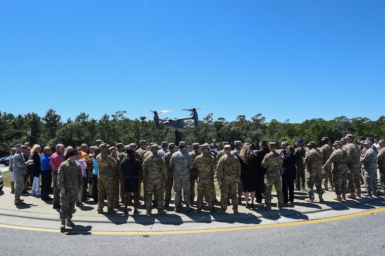 Members of team Hurlburt gather to dedicate the new CV-22 Osprey model at Hurlburt Field, Fla., April 6, 2017. The CV-22 model was donated by the Boeing Company to showcase the capabilities of the CV-22 and to show their appreciation of their partnership with the Air Force. (U.S. Air Force photo by Senior Airman Jeff Parkinson) 
