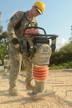 Spc. Troy Hanson, an engineer with 672nd Engineer Compnay, an Army Reserve unit from Missoula, Montana, works on the foundation for a new clinic in Ladyville, Belize. The clinic is being built as part of Beyond the Horizon 2017, a partnership exercise between the Government of Belize and U.S. Southern Command that will provide free medical service events and five construction projects throughout Belize. (U.S. Army Photo by Sgt. Eric Roberts)