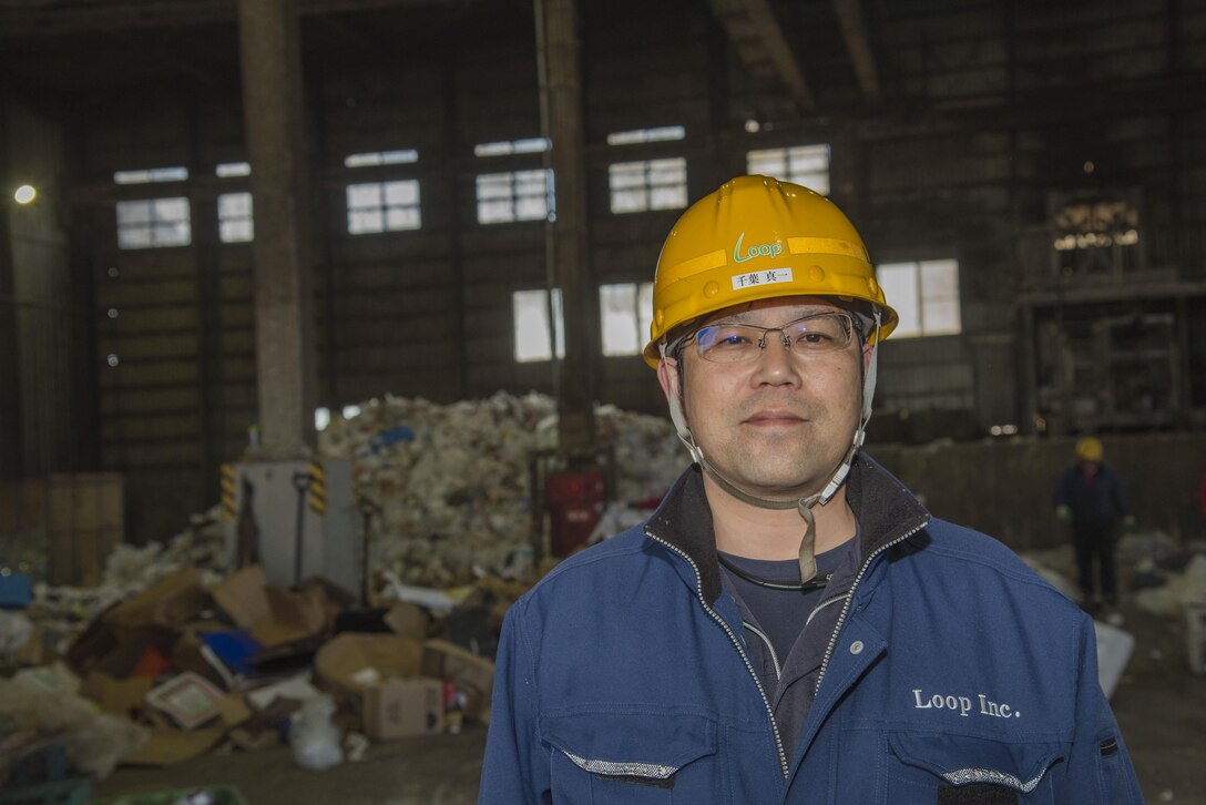 Shimichi Chiba, recycling center manager, pauses for a photo at Misawa, Japan, March 20, 2017. Misawa Air Base’s recycling center takes many items including paper, magazines, cardboard, aluminum, scrap metal, glass, plastic and car tires to assist in increasing Japan’s raw metal storage to be reused for the country’s infrastructure. (U.S. Air Force photo by Airman 1st Class Sadie Colbert)