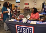 (From left) Katrina Leverette, Defense Logistics Agency Aviation sexual assault response coordinator talks with Cassinda Thomas, Fort Lee USO Center director about resources available to victims of sexual assault in the Richmond area during a Sexual Assault Awareness and Prevention Month resource fair held at the Defense Supply Center’s restaurant April 5, 2017. (Photo by Kimberly K. Fritz) 