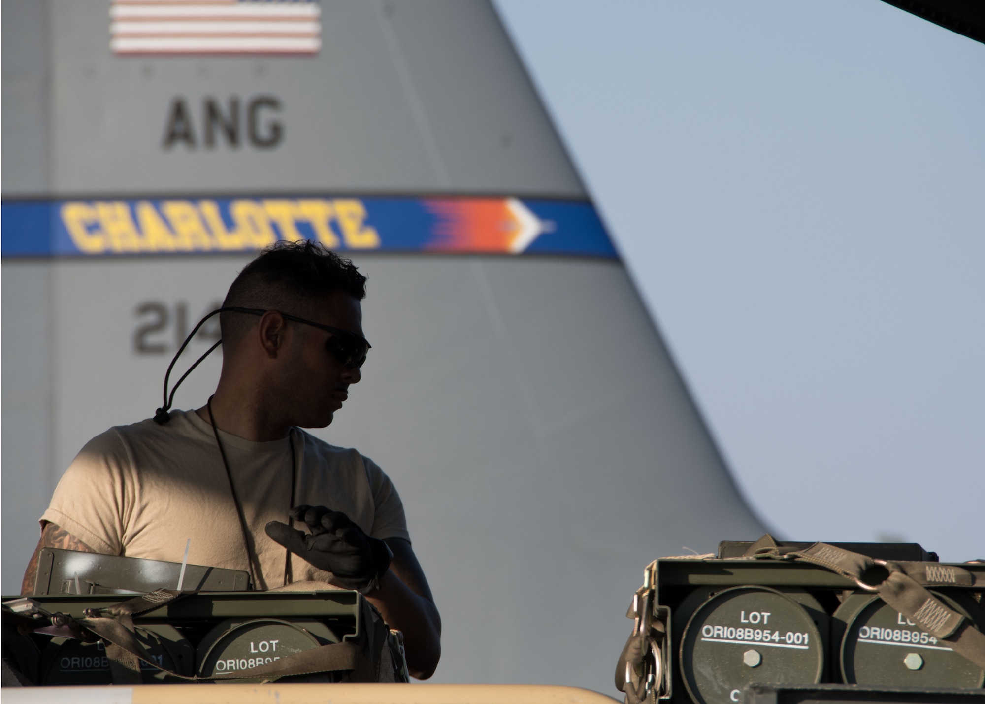 A 386th Expeditionary Logistics Readiness Squadron aerial porter watches as pallets are rolled down the K-loader in preparation for loading onto the back of a C-130H Hercules deployed with the Connecticut Air National Guard at an undisclosed location in Southwest Asia March 27, 2017. This deployment is providing Connecticut ANG pilots the opportunity to fly diverse missions as part of their first C-130 deployment. (U.S. Air Force photo/Staff Sgt. Andrew Park)