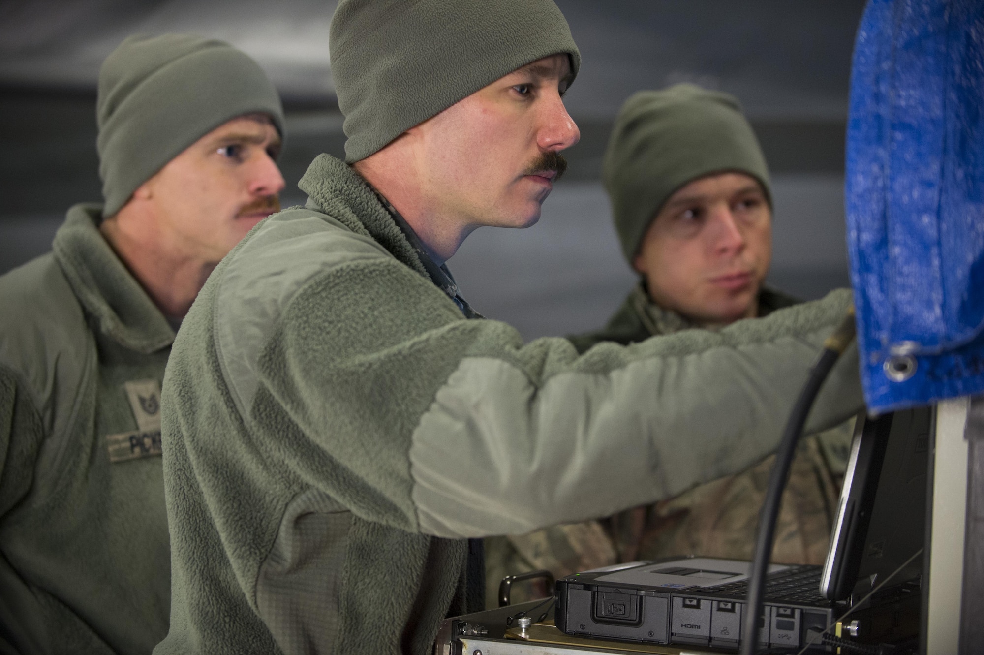 Staff Sgt. John Holm, center, Tech. Sgt. Jesse Pickrell, left, and Tech. Sgt. Matthew Hoover, Combat Shield team
members from the 16th Electronic Warfare Squadron, Eglin Air Force Base, Fla., conduct diagnostic testing evaluations on an F-16 Fighting Falcon at Spangdahlem Air Base, Germany, March 23, 2017. Holm and the team used a USM-642 Raven signal generator to simulate real-world radar emissions and test the sensitivity of an F-16’s threat detection systems during the evaluations. (U.S. Air Force photo by Senior Airman Dawn M. Weber)