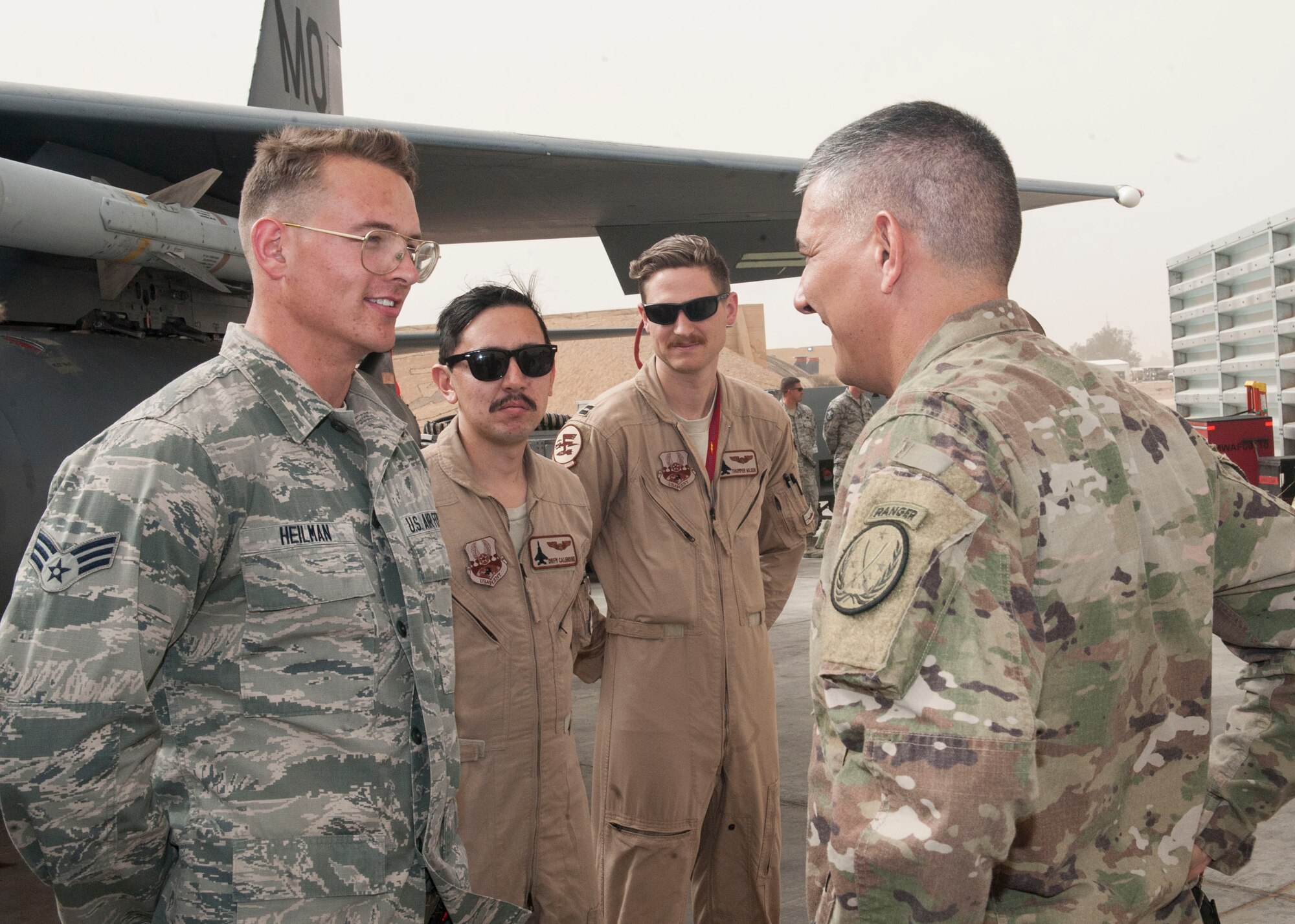 U.S. Army Lt. Gen. Stephen Townsend, Combined Joint Task Force – Operation Inherent Resolve commanding general, speaks with U.S. Air Force Senior Airman Dustyn Heilman, 332nd Expeditionary Maintenance Squadron aerospace propulsion journeyman April 5, 2017, in Southwest Asia. The general visited Airmen and Soldiers thanking them for their contribution to the mission. (U.S. Air Force photo by Tech Sgt. Eboni Reams)