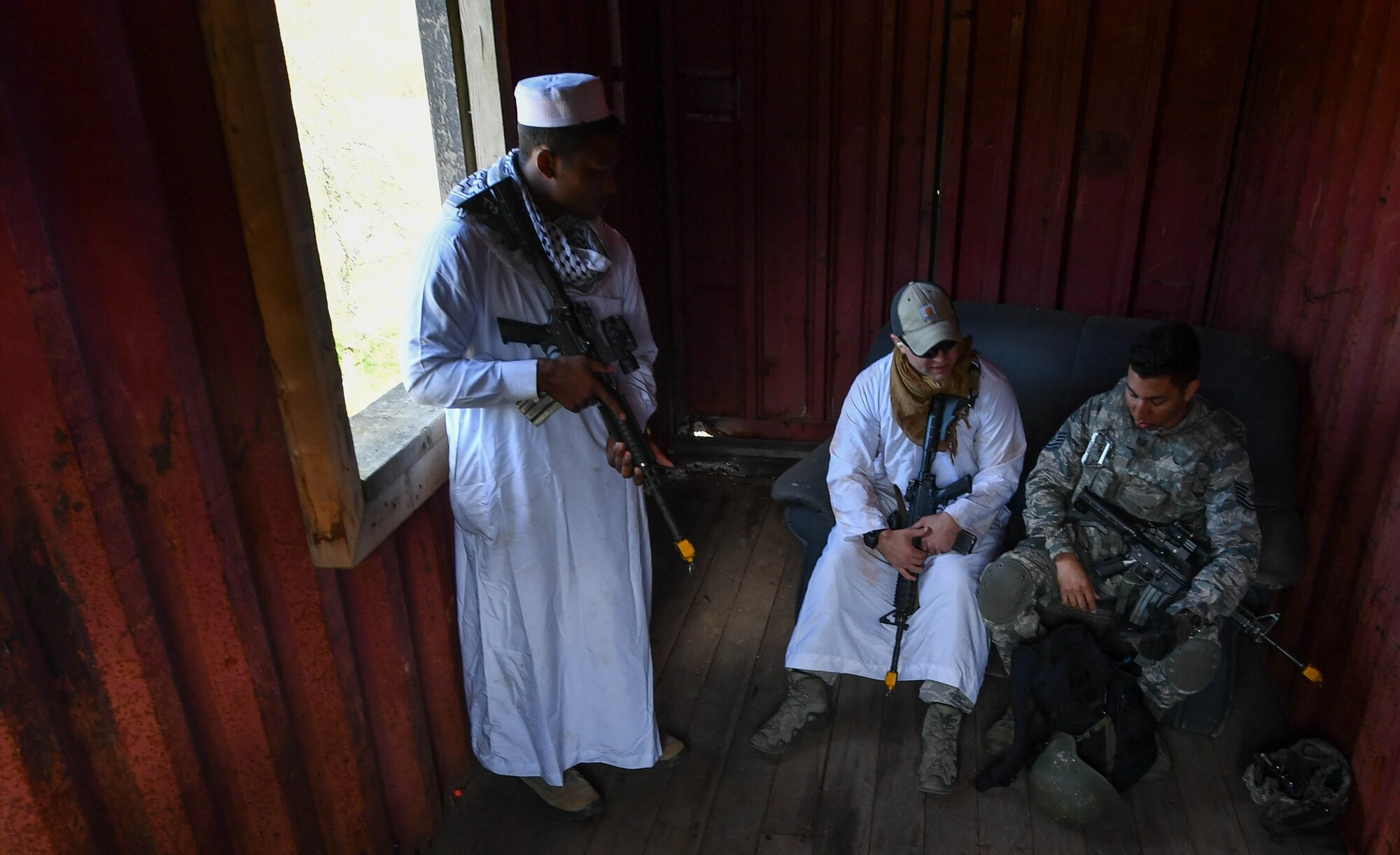 Staff Sgt. Christian Gomez, 569th U.S. Forces Police Squadron Bravo Flight chief, speaks with a simulated foreign village leader during the urban operations portion of the 435th Security Forces Squadron’s Ground Combat Readiness Training Center’s Security Operations Course on U.S. Army Garrison Baumholder, Germany, April 4, 2017. Airmen assigned to the 86th SFS, 422nd SFS, 100th SFS, and 569th USFPS participated in the course. (U.S. Air Force photo by Senior Airman Tryphena Mayhugh)
