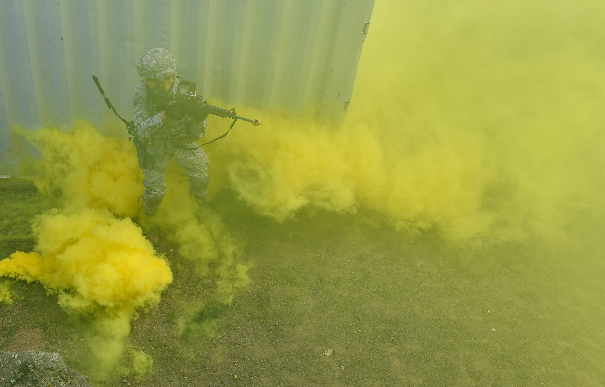 A student of the 435th Security Forces Squadron’s Ground Combat Readiness Training Center’s Security Operations Course is surrounded by smoke during the urban operations portion of the course on U.S. Army Garrison Baumholder, Germany, April 4, 2017. The students also performed mounted and dismounted operations while at Baumholder. Airmen assigned to the 86th SFS, 422nd SFS, 100th SFS, and 569th U.S. Forces Police Squadron participated in the course. (U.S. Air Force photo by Senior Airman Tryphena Mayhugh)