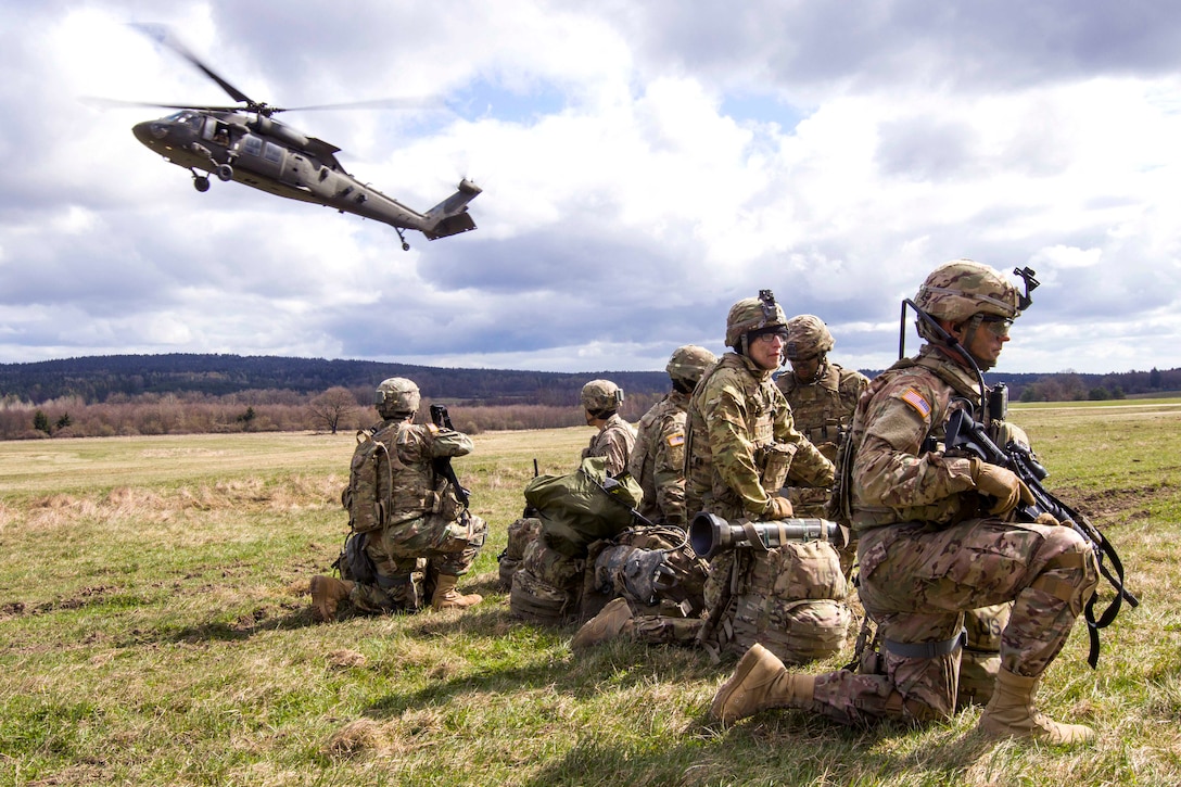 Soldiers provide perimeter security as a UH-60 Black Hawk helicopter prepares to land during air assault training at Grafenwoehr Training Area, Germany, April 6, 2017. Army photo by Spc. Thomas Scaggs 