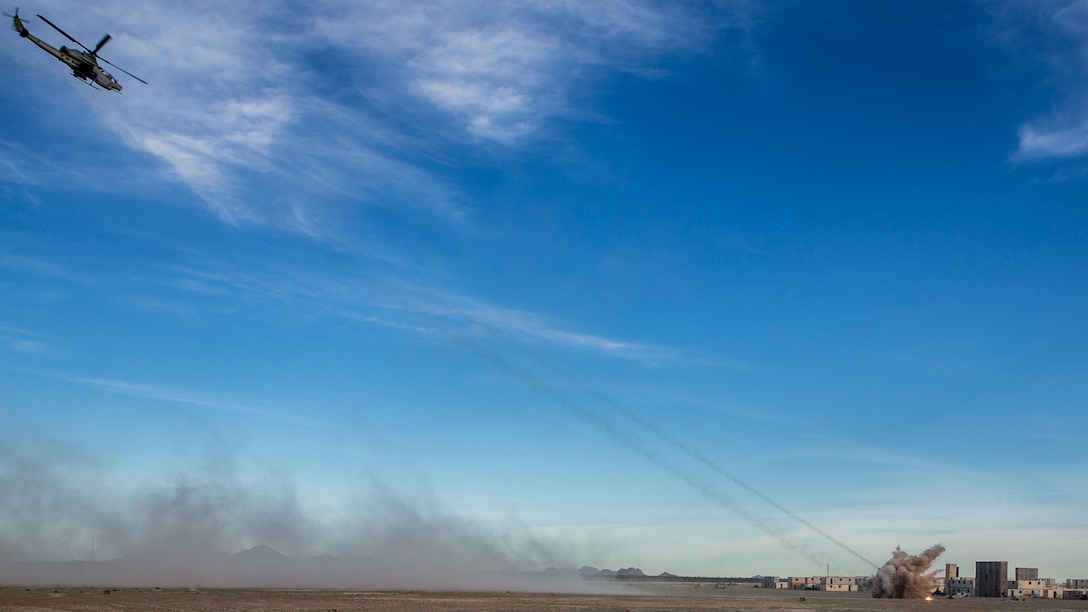 A Marine AH-1Z Venom attached to Marine Aviation Weapons and Tactics Squadron One (MAWTS-1) engage targets during an urban close air support (UCAS) exercise in support of Weapons and Tactics Instructor Course (WTI) 2-17 at Yodaville, Ariz., April 6, 2017. The UCAS exercise was designed to focus on specific employment of tactical air and rotary wing offensive air support aviation assets in order to support the ground combat element scheme of maneuver. WTI is a seven-week training event hosted by MAWTS-1 cadre, which emphasizes operational integration of the six functions of Marine Corps aviation in support of a Marine Air Ground Task Force and provides standardized advanced tactical training and certification of unit instructor qualifications to support Marine Aviation Training and Readiness and assists in developing and employing aviation weapons and tactics. 