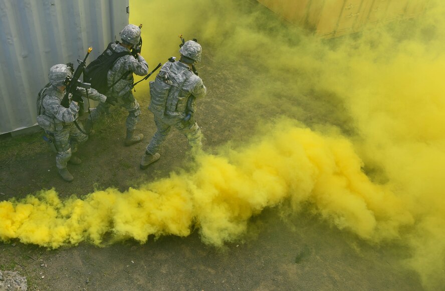 Students of the 435th Security Forces Squadron’s Ground Combat Readiness Training Center’s Security Operations Course tactically move about a simulated village during the urban operations portion of the course on U.S. Army Garrison Baumholder, Germany, April 4, 2017. The two-week course began March 24 and provides pre-deployment training to security forces Airmen who will be going downrange. Airmen assigned to the 86th SFS, 422nd SFS, 100th SFS, and 569th U.S. Forces Police Squadron participated in the course. (U.S. Air Force photo by Senior Airman Tryphena Mayhugh)