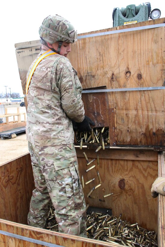 U.S. Army Reserve Spc. Josh Kohon, motor transport operator, combines spent ammunition for turn in at the Ammunition Transfer Handling Point during Operation Cold Steel at Fort McCoy, Wis., March 30, 2017. Operation Cold Steel is the U.S. Army Reserve's crew-served weapons qualification and validation exercise to ensure that America's Army Reserve units and Soldiers are trained and ready to deploy on short-notice and bring combat-ready and lethal firepower in support of the Army and our joint partners anywhere in the world. (U.S. Army Reserve photo by Staff Sgt. Debralee Best, 84th Training Command)