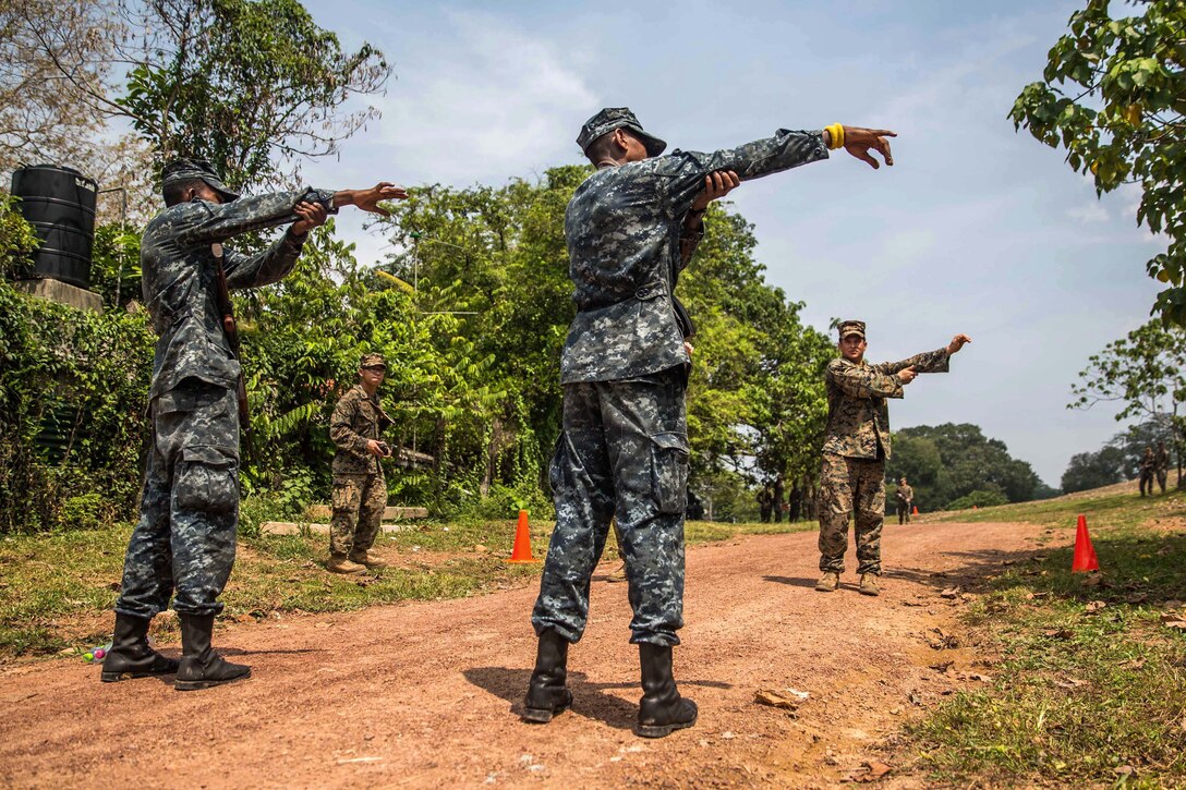 U.S. Marines demonstrate personnel searches during the processing phase of a simulated humanitarian assistance and disaster relief exercise, part of a military tactics training and exchange at Welissara Naval Base, Sri Lanka, March 29, 2017. Marine Corps photo by Cpl. Devan K. Gowans