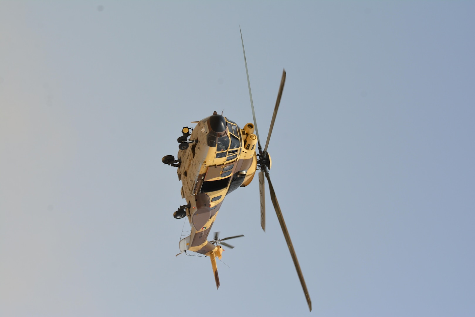 Kuwait- A AS332, Super Puma, helicopter drops off troops before a large crowd of foreign and U.S. dignitaries view teams from their combined special forces- Qatar, Kuwait, Saudi Arabia and the United States, during an explosive training mission  proving the successful interoperability of both land and air assets as well as highlighting the vast skills of the varied partner nations part of Operation Eagle Resolve, April 2. 
(Photo by Army Sgt. 1st Class Suzanne Ringle/Released)