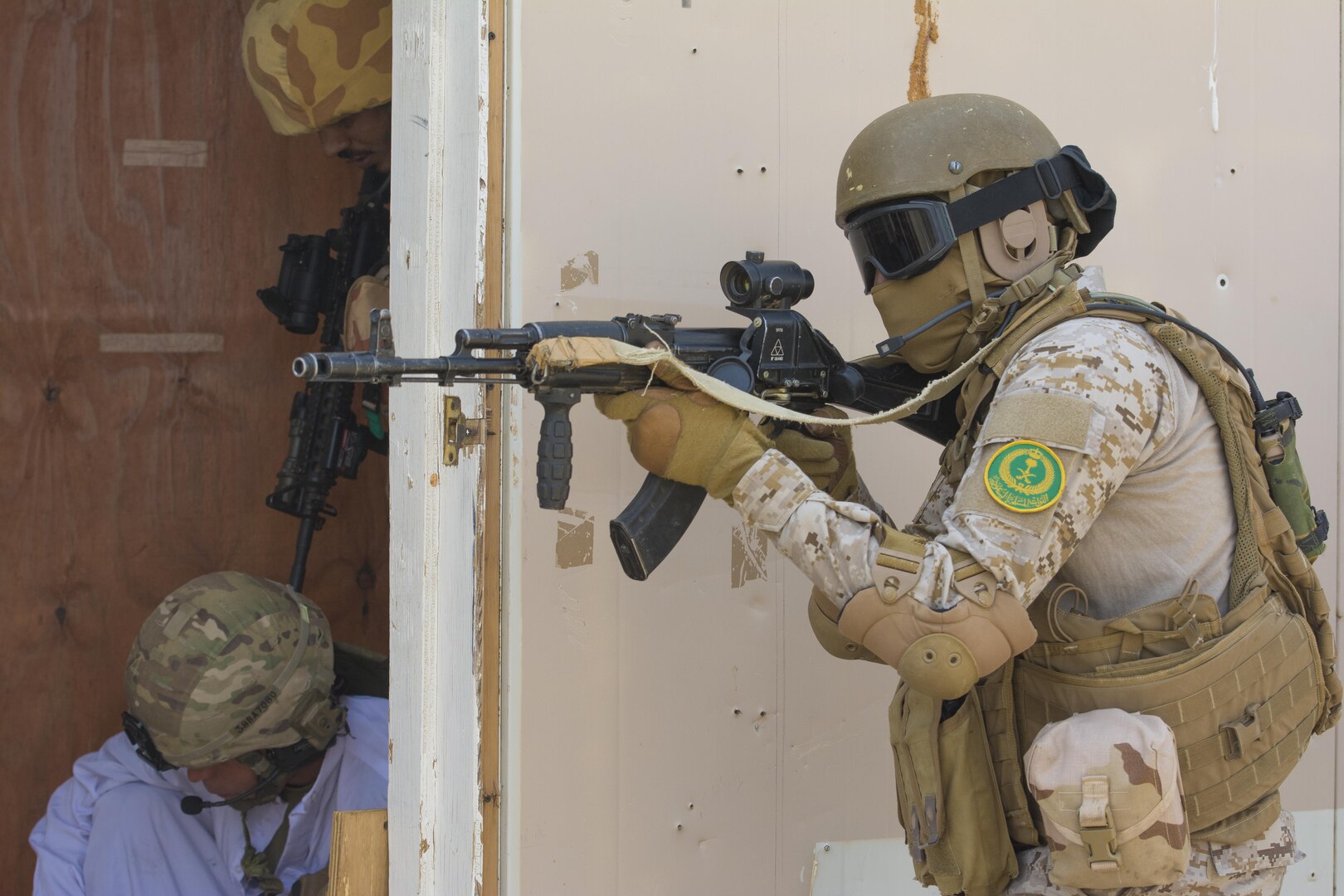 Kuwait- A large crowd of foreign and U.S. dignitaries view teams from their combined special forces- Qatar, Kuwait, Saudi Arabia and the United States, take out combatants during an explosive training mission  proving the successful interoperability of both land and air assets as well as highlighting the vast skills of the varied partner nations part of Operation Eagle Resolve, April 2. 
(Photo by Army Sgt. 1st Class Suzanne Ringle/Released)